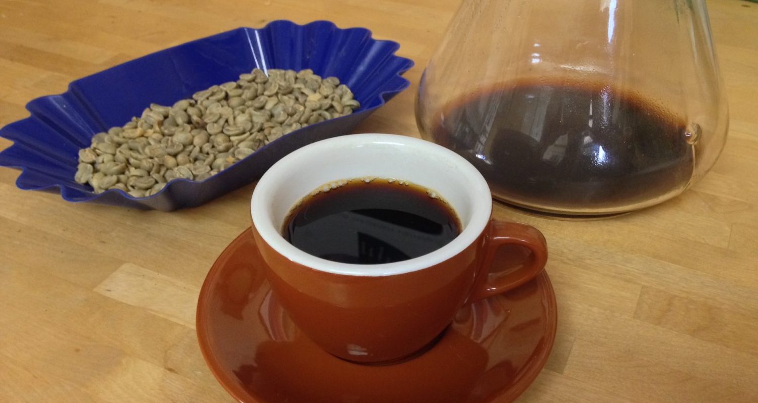 Specialty Green Coffee Sample with Black Coffee Cup
